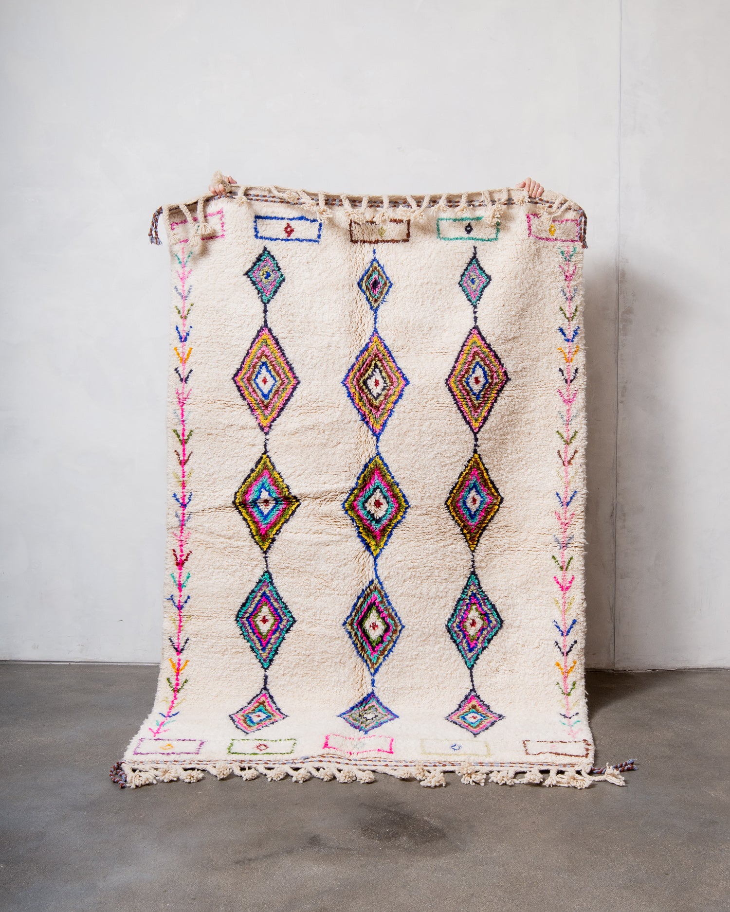Modern, designer, handcrafted Berber rug from Morocco. Beniourain carpet with beautiful colours and patterns and fluffy wool texture.
